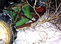 Photo of overturned tractor