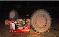 picture of overturned tractor