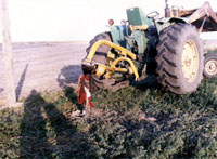 Photo of tractor with auger entanglement