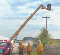 Photo of forklift touching power lines