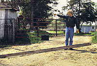 Photo of FACE Trauma Investigator in the barnyard