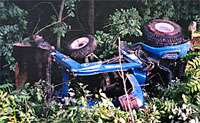 Photo of overturned tractor