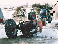 Photo of overturned tractor