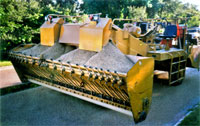 Front view of rock-chip spreader machine